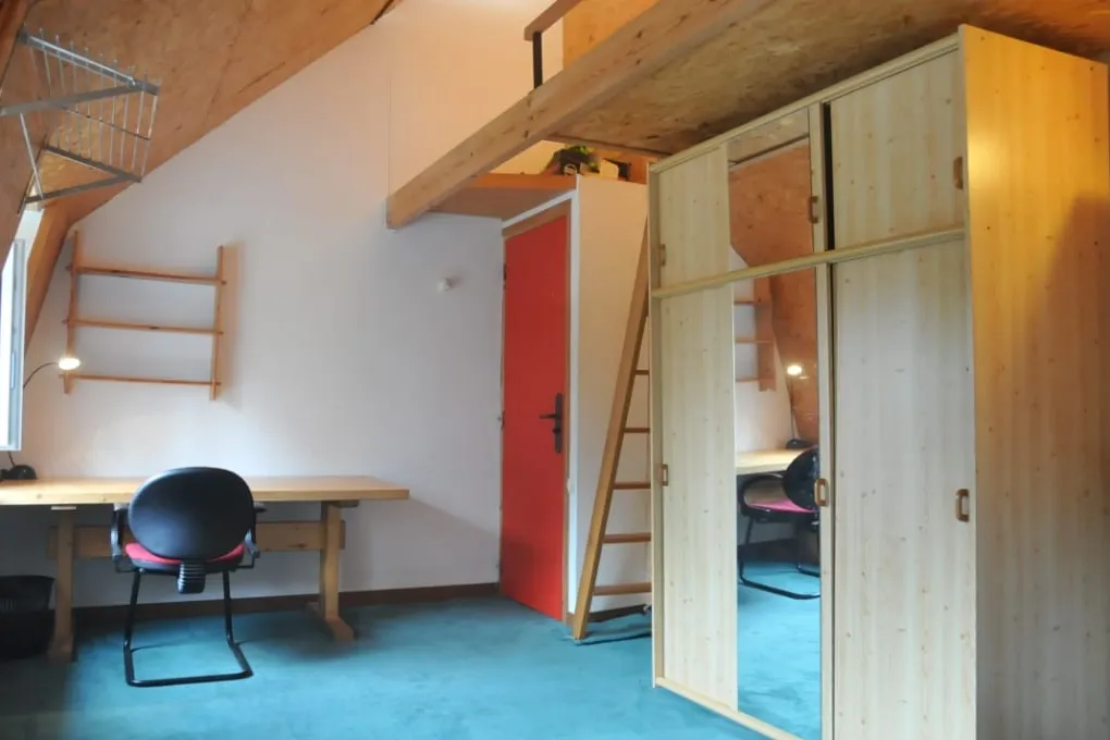 Attic room 5 with desk, wooden wardrobes and mezzanine bed